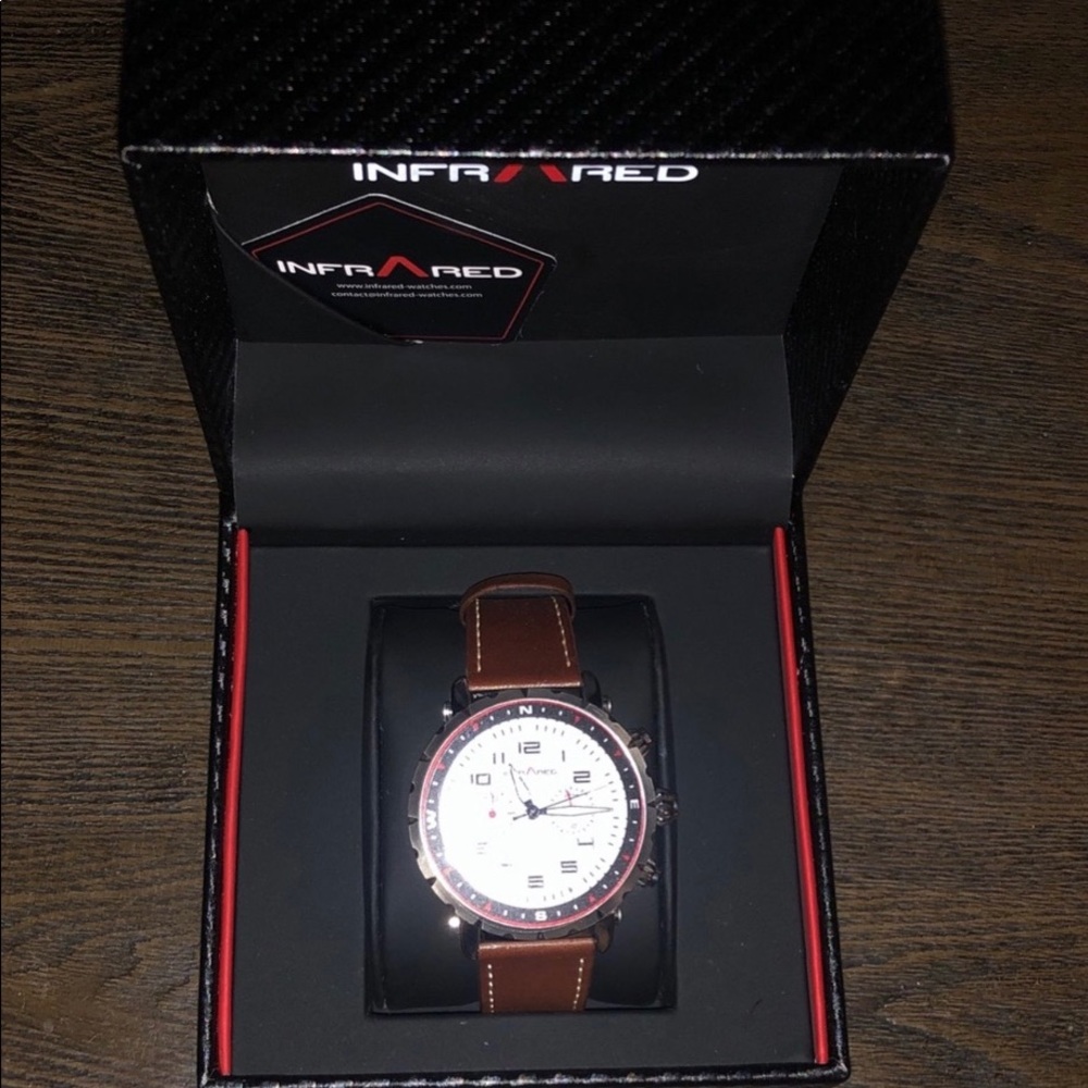 brown and silver brand new analog watch with tags